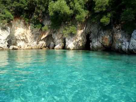 Boating on the coast of Ipsos to the cave!